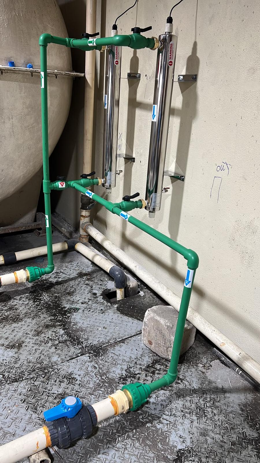 Dual UV sterilizer installation with green PPR piping
